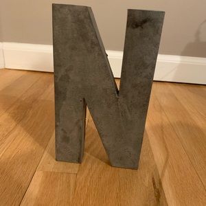 Two (2) tin/metal initials: N and A, from Anthropologie
